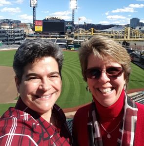Patty Kreamer and Michelle R. Donovan speaking for financial advisor group at PNC Park